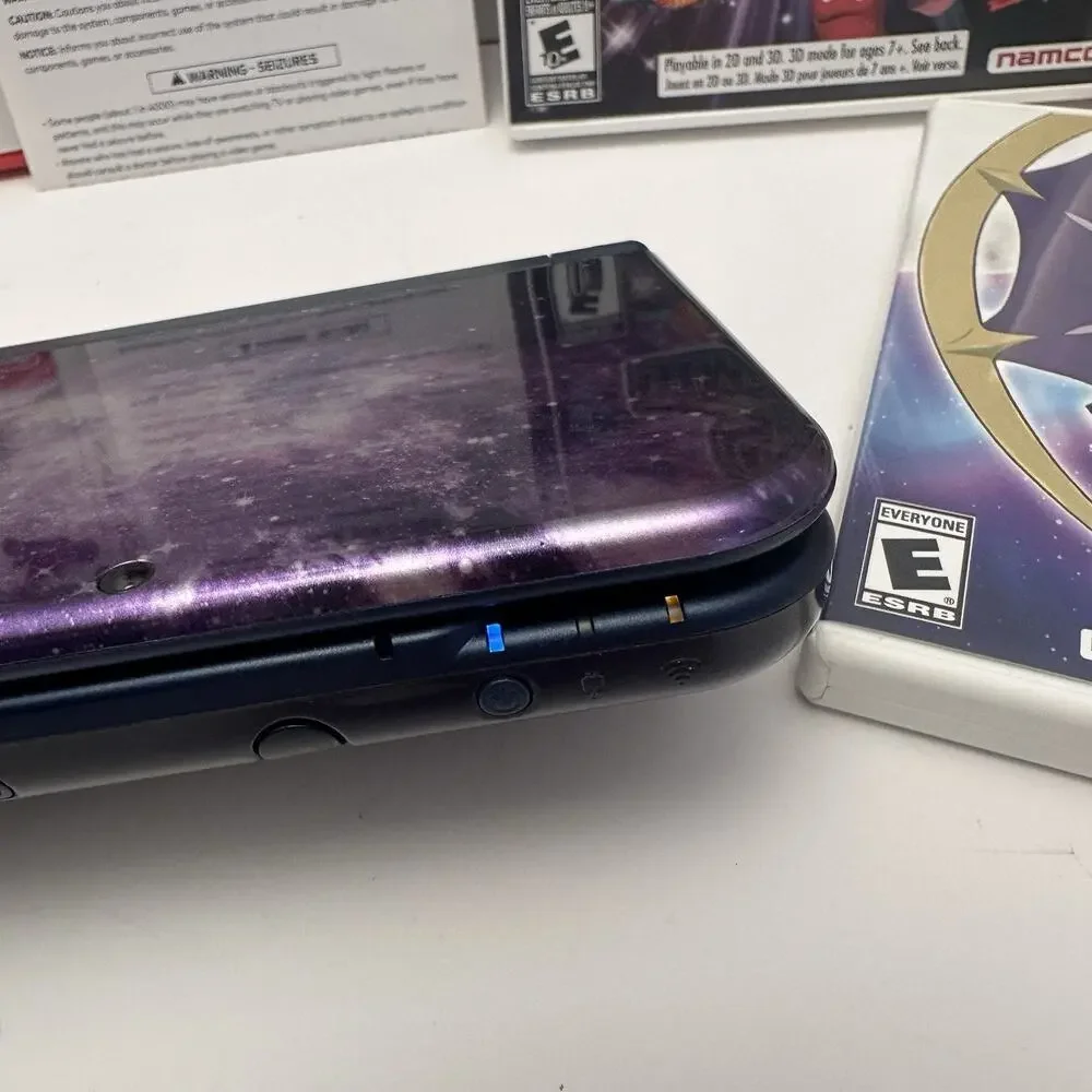 Nintendo New 3DS XL Purple Galaxy Edition - Charger, Stylus, Manual & 4 Games