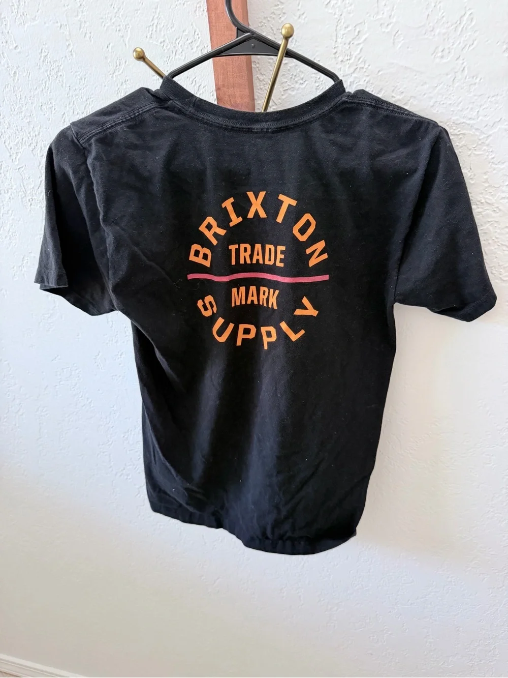 Brixton Black Tee with Small Orange Logo