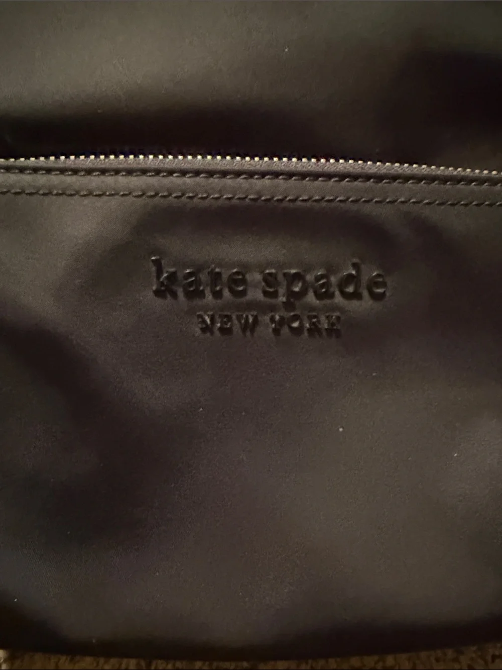 kate spade black backpack with front zip pocket