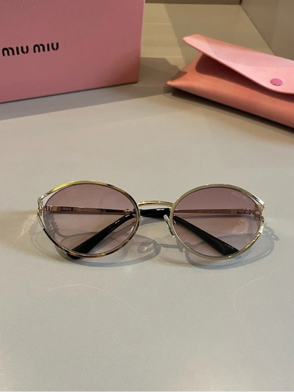Miu Miu Gold Frame Sunglasses with Pink Gradient Lenses