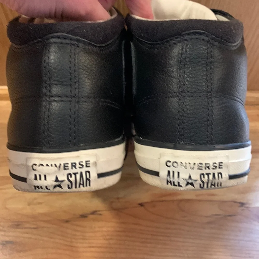 Converse black leather Chuck Taylor Size 8 men’s mid top sneakers EUC