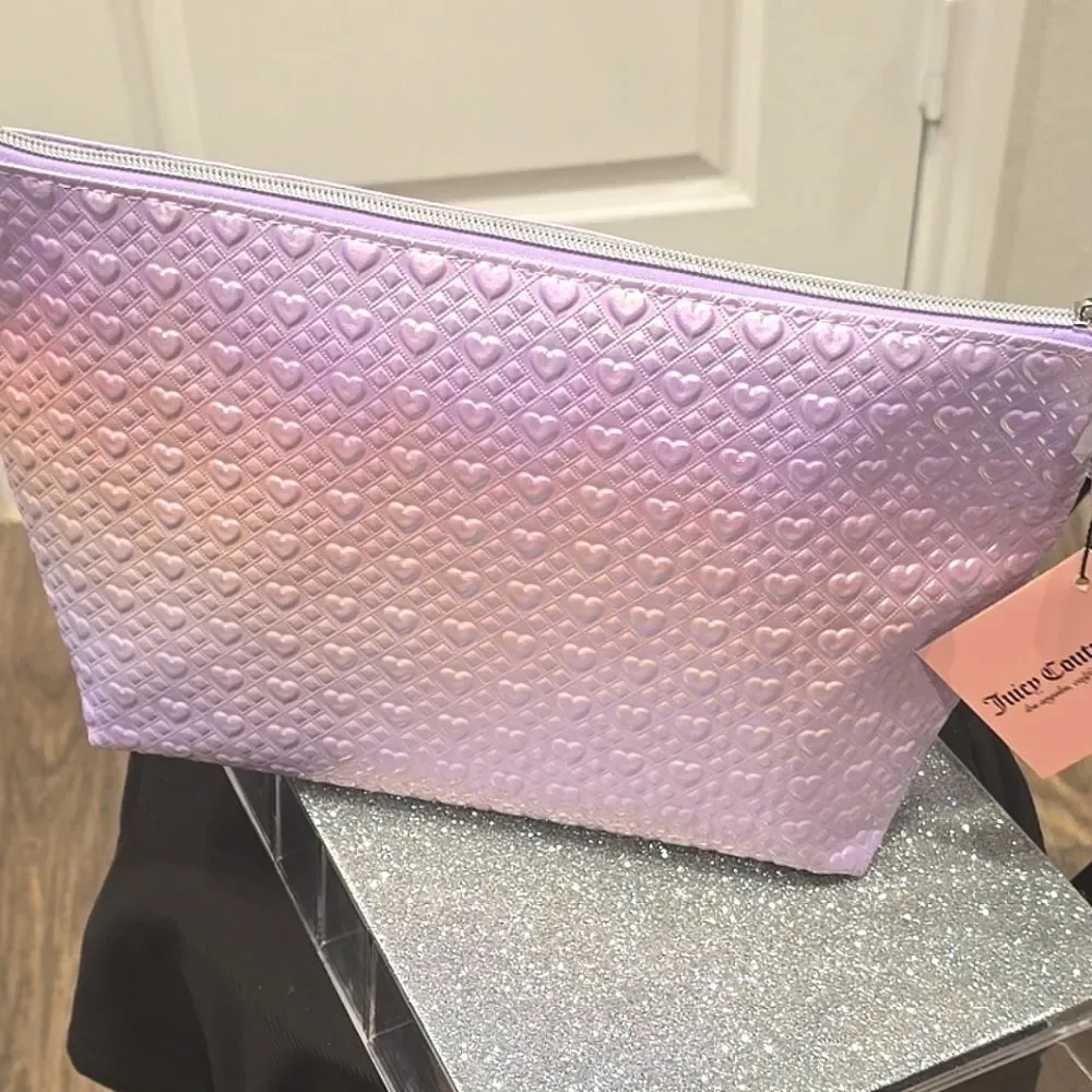 Juicy Couture photos more