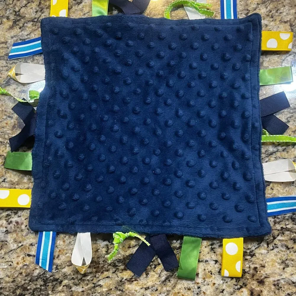 Title Unknown taggie blue