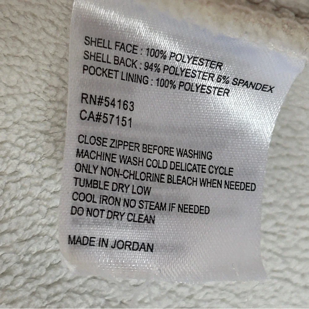 Andrew Marc cream colored