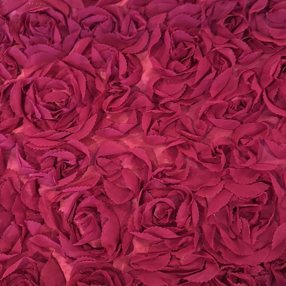 Red pillow case with embellishments of rose flowers zipper