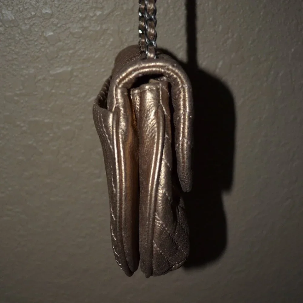 CHANEL bronze leather