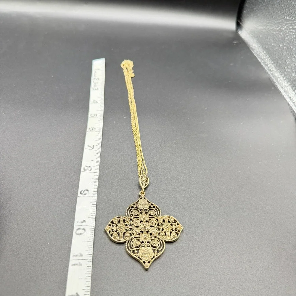 Charming Charlie ornate gold