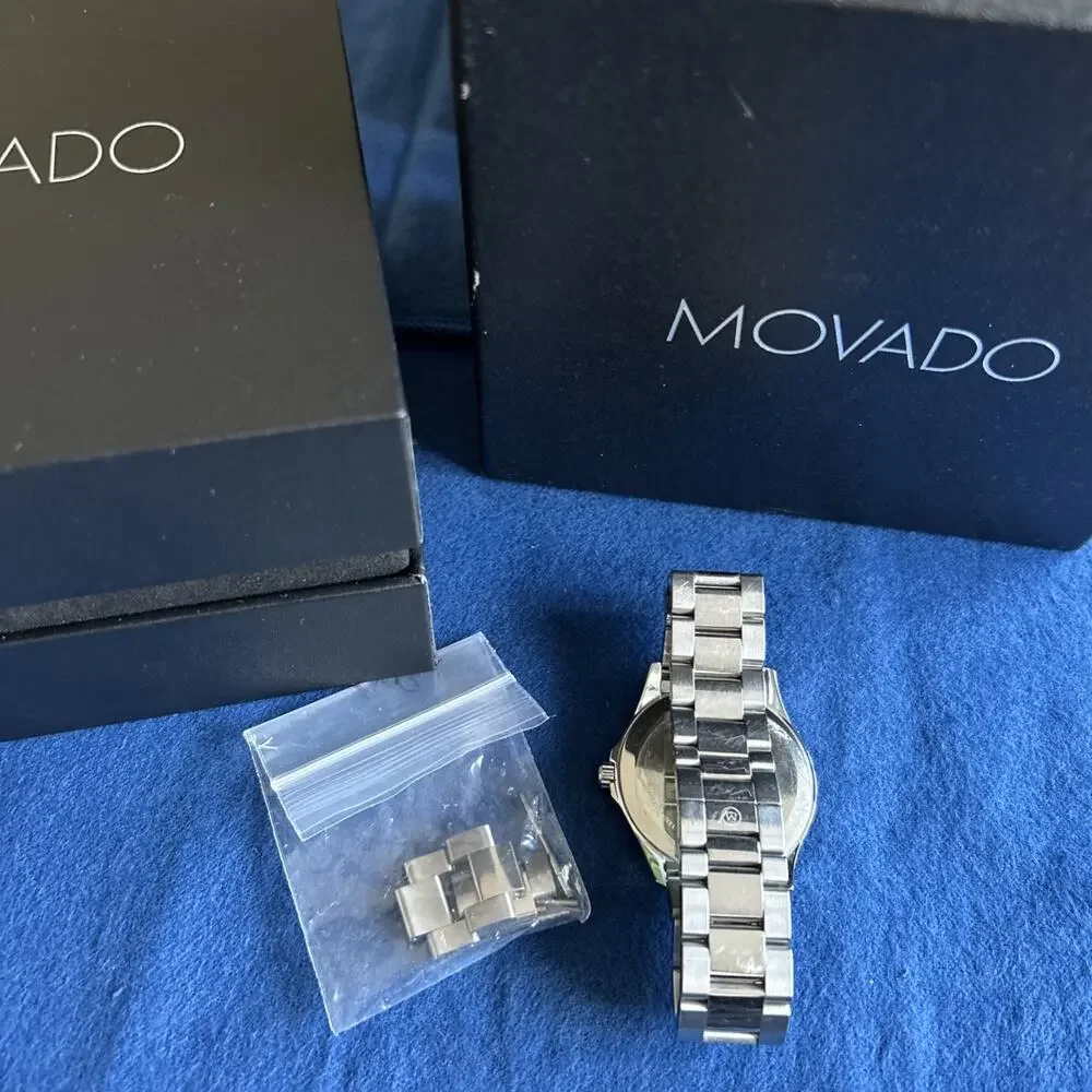 Movado stainless quartz included