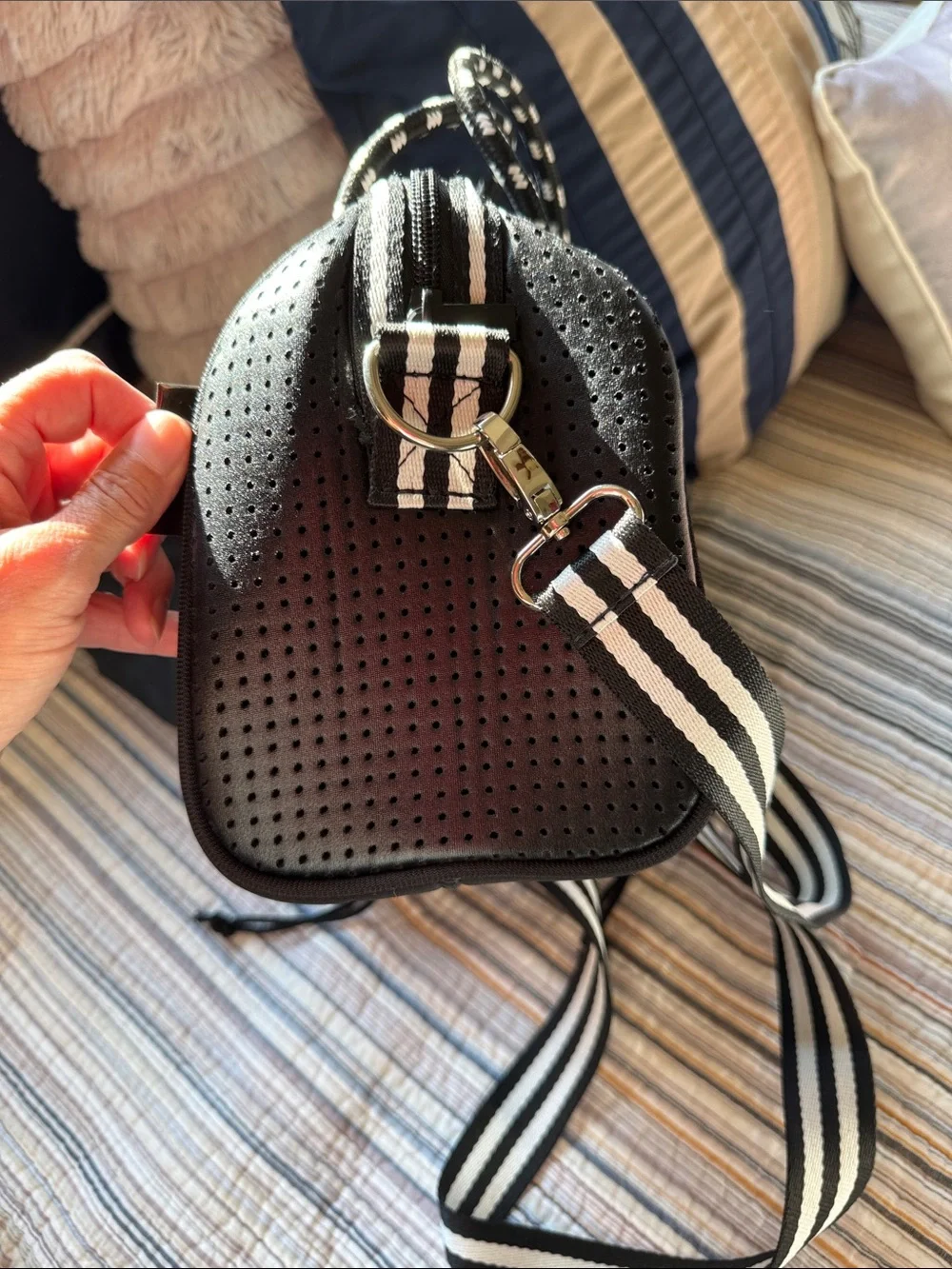 Black Crossbody Barrel Bag with Cream-Striped Accent