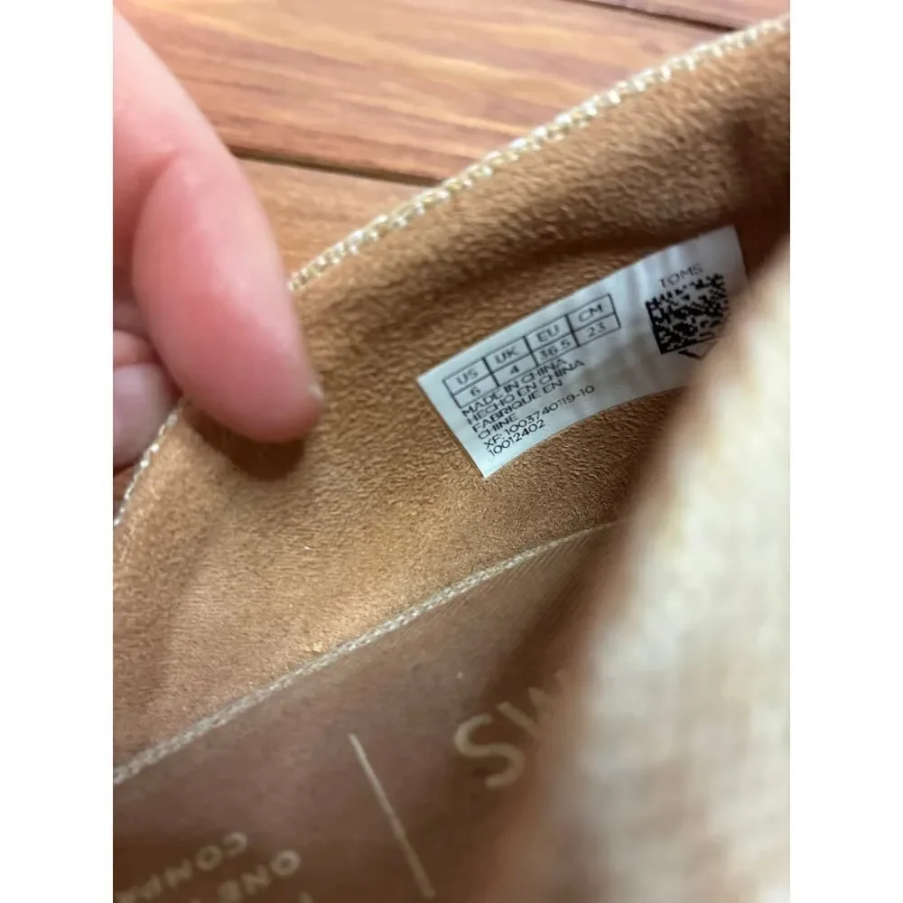 Toms featuring premium