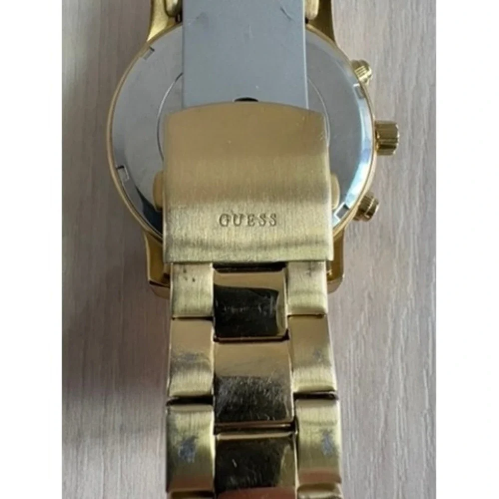Guess material gold
