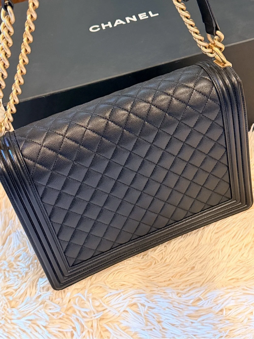 CHANEL Black Quilted Shoulder Bag with Gold Hardware and Chain Strap