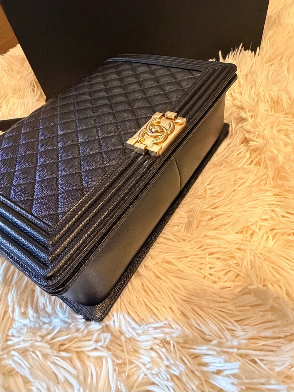 CHANEL Black Quilted Shoulder Bag with Gold Hardware and Chain Strap