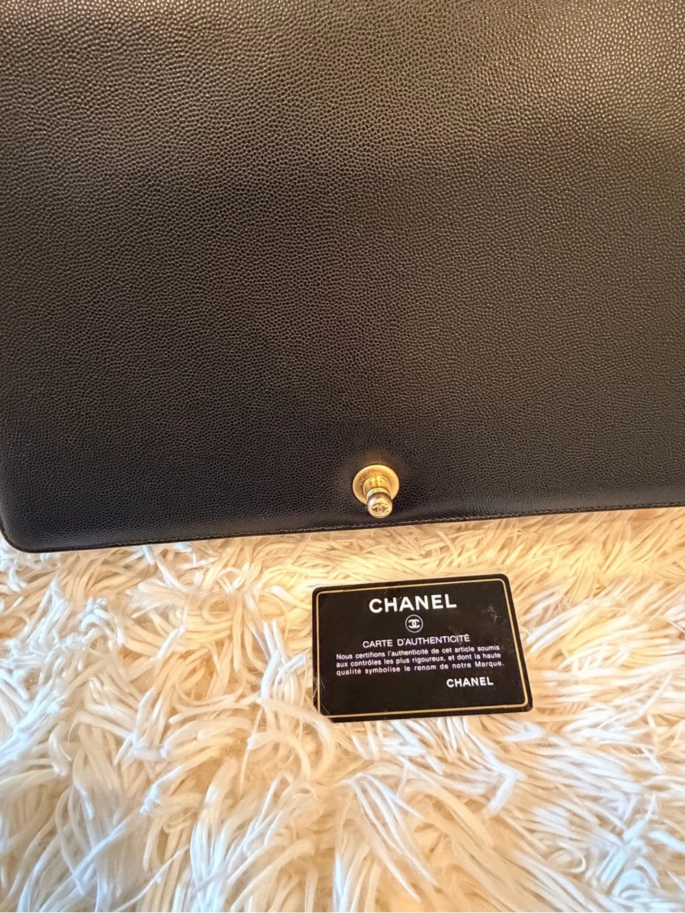 CHANEL Black Quilted Shoulder Bag with Gold Hardware and Chain Strap