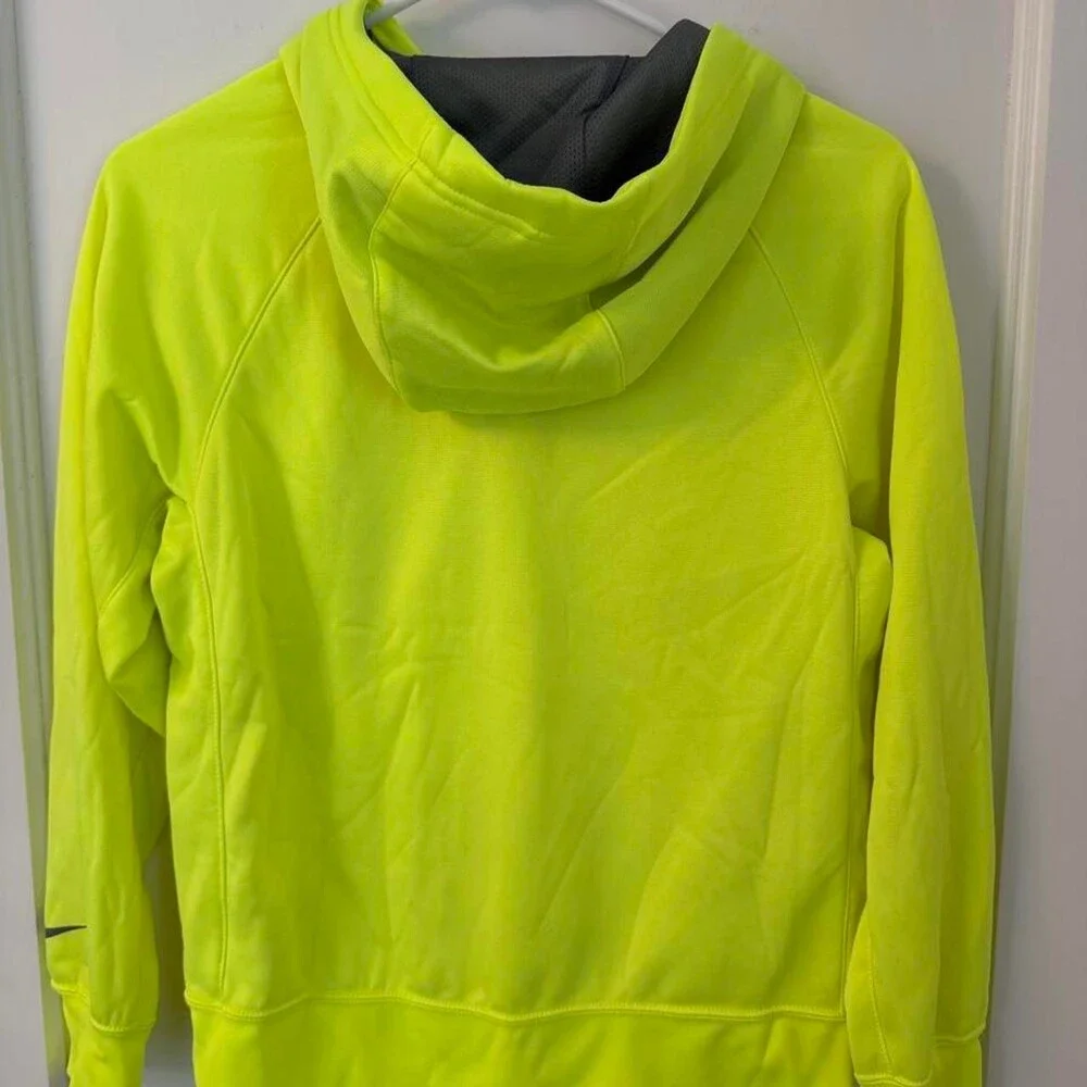 Nike Therma-Fit Hoodie in neon yellow with black camouflage Nike logo, size yout