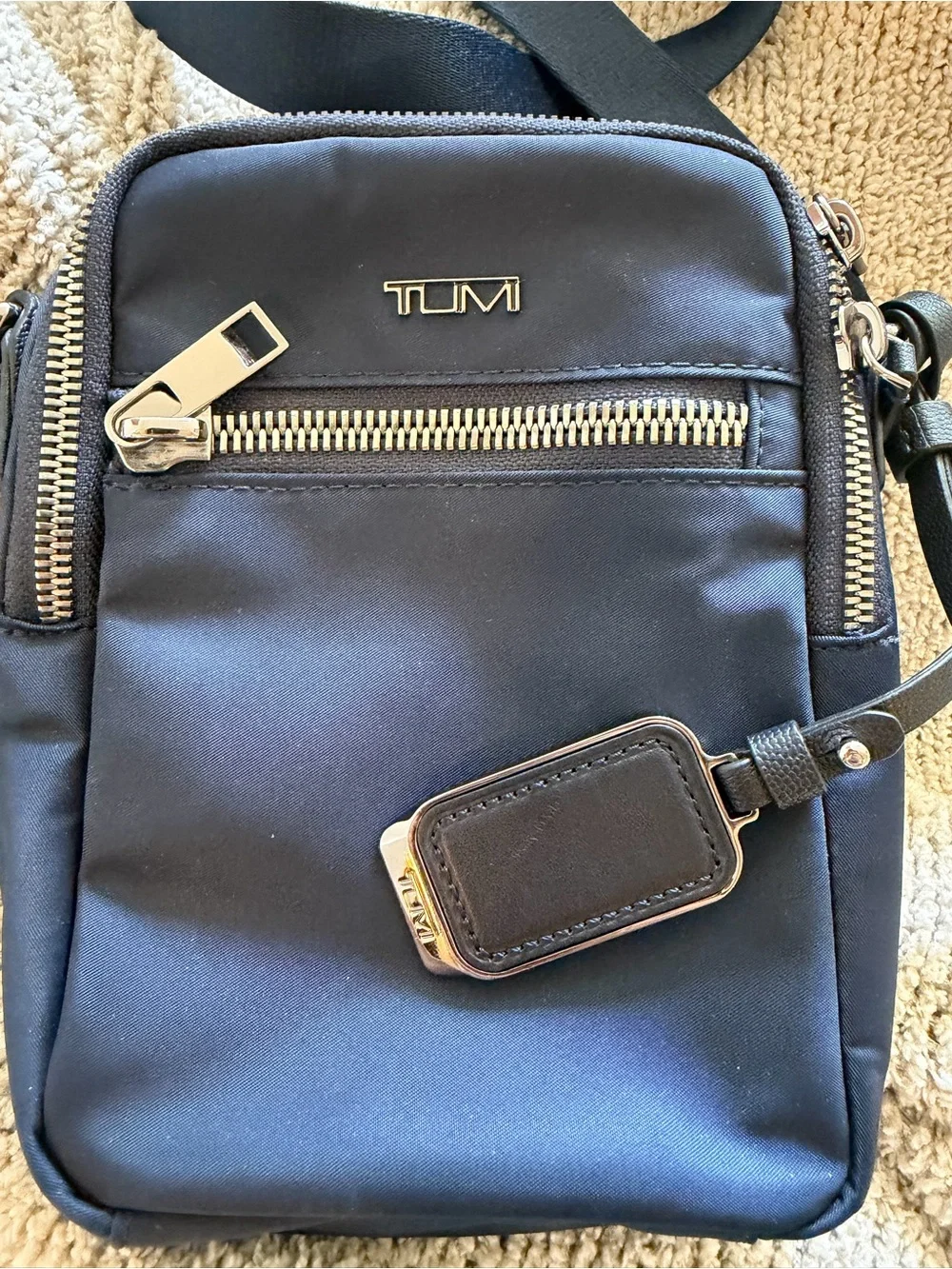 Tumi navy crossbody