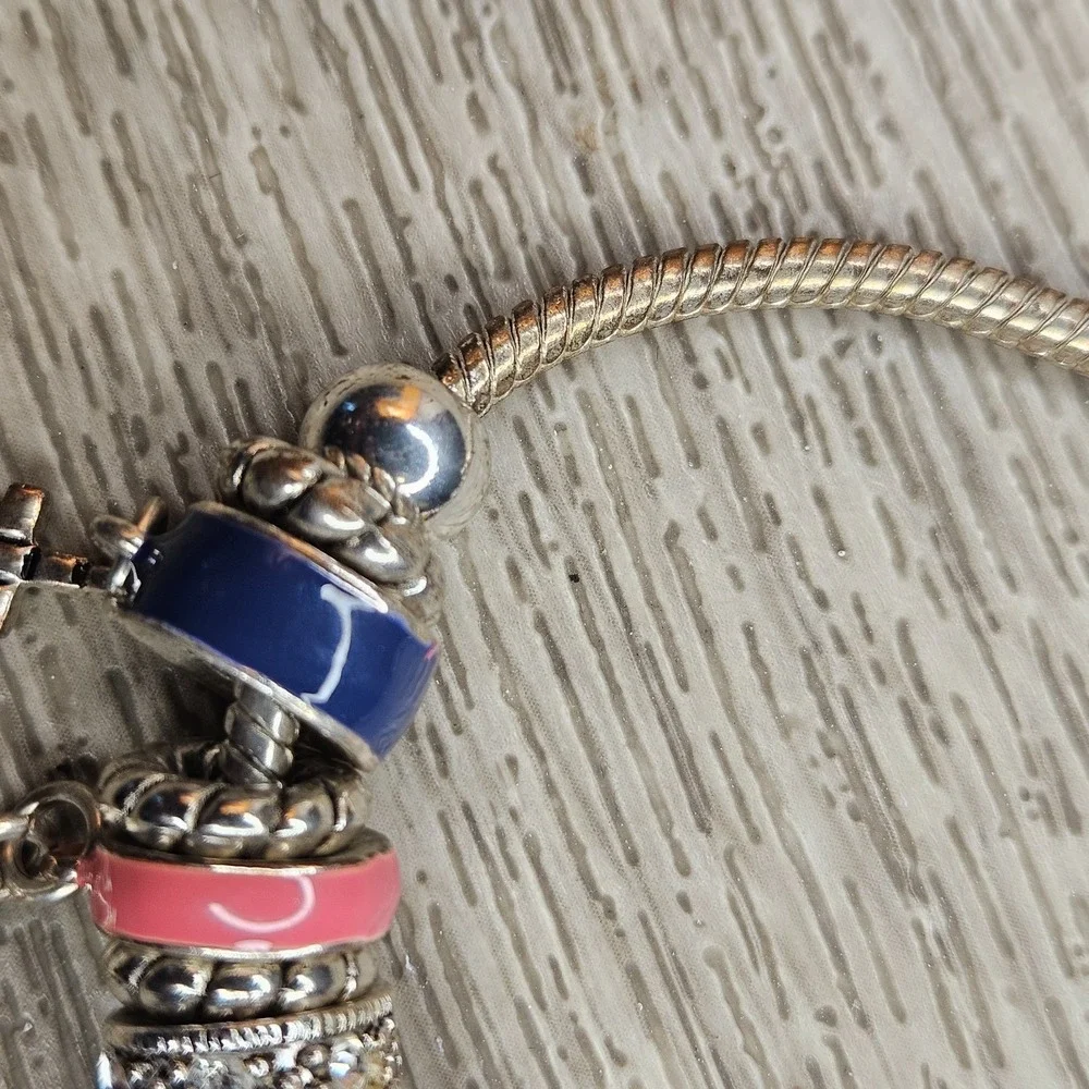 Source Unknown silver tone