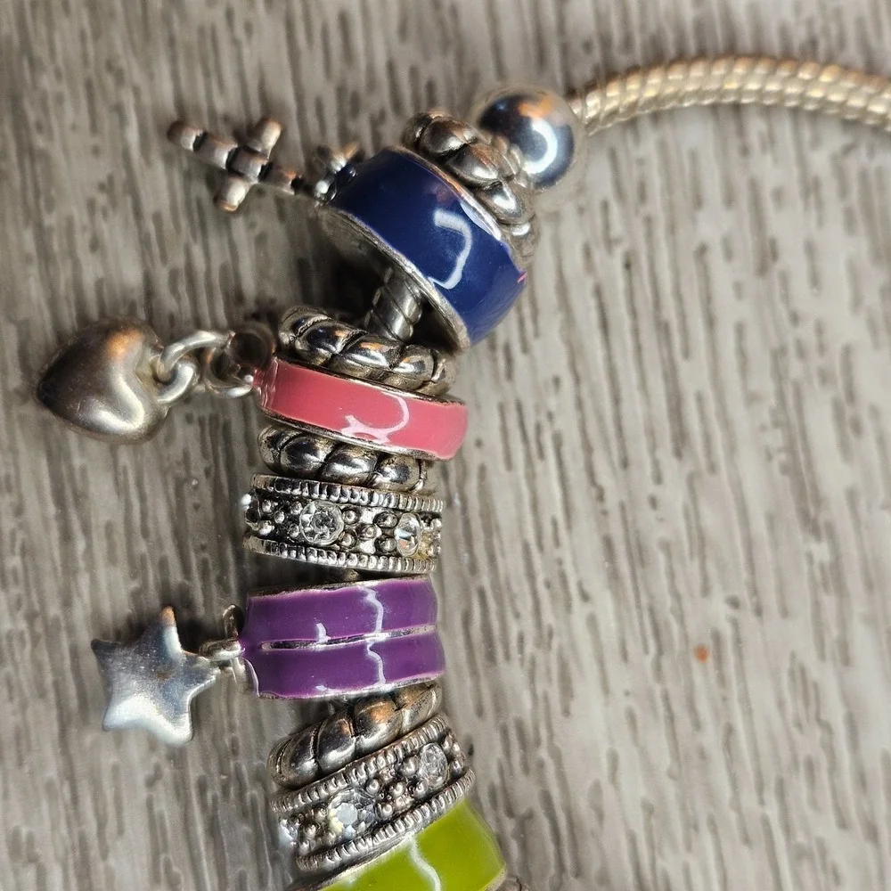Source Unknown silver tone