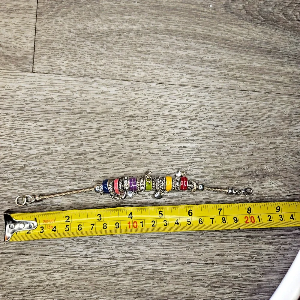 Source Unknown silver tone